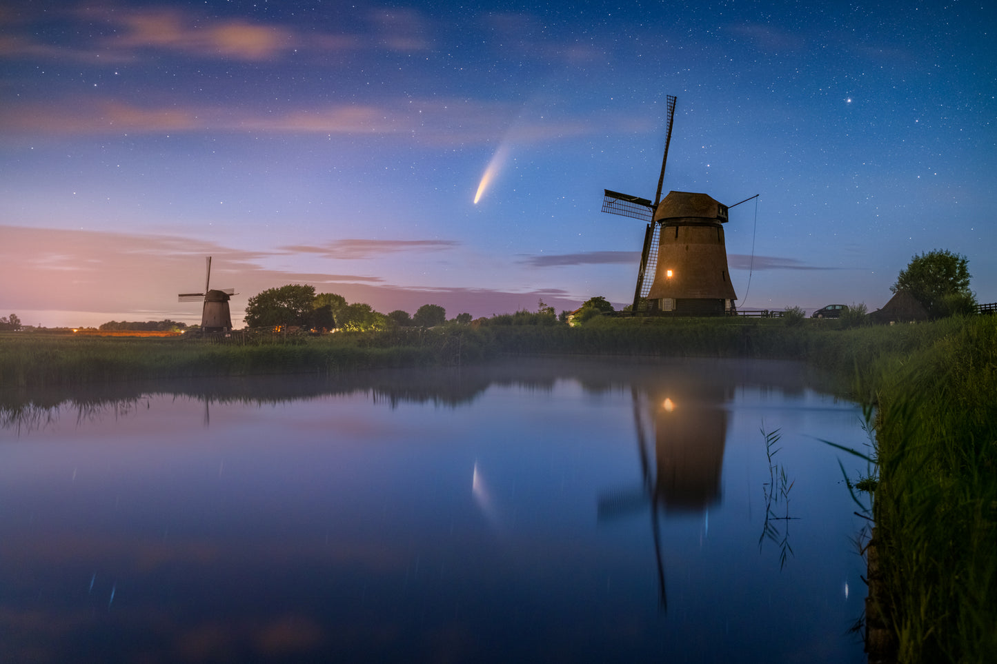 Neowise comet above windmills
