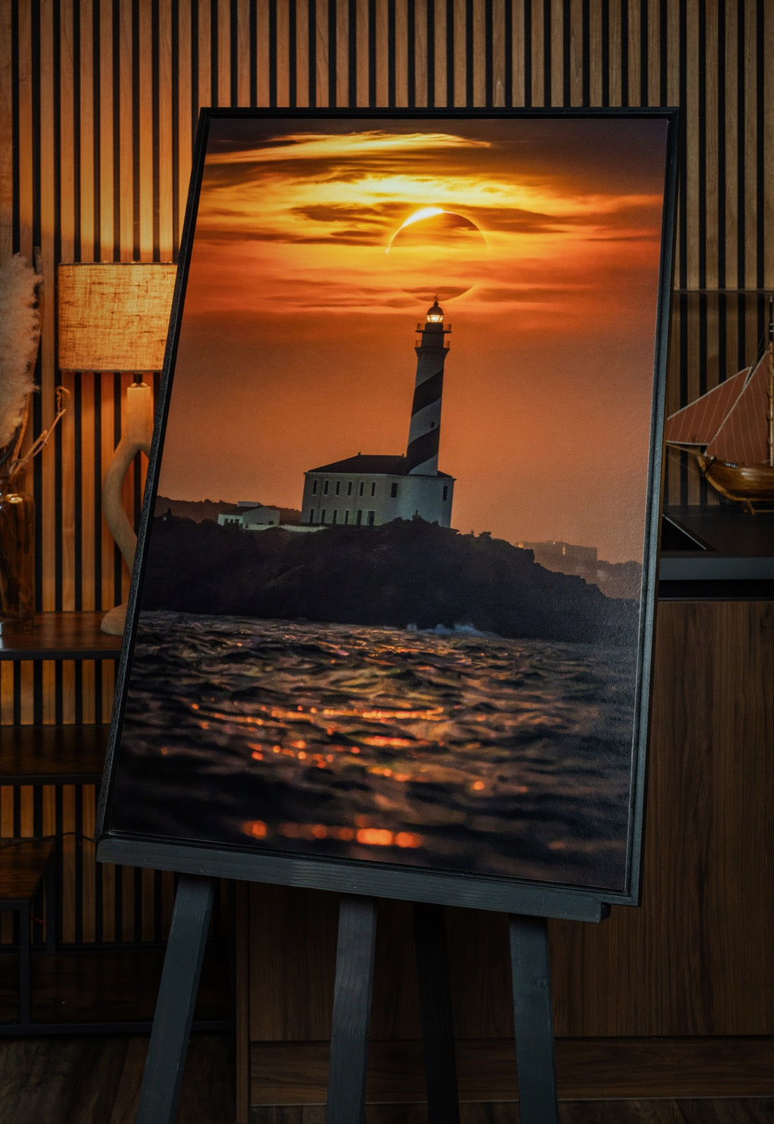 The Lighthouse Eclipse framed, in the gallery